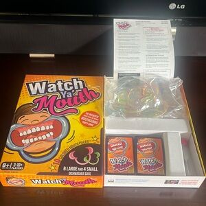 Watch Ya Mouth Family Fun Game. 3-10 Players. Ages 8+.
